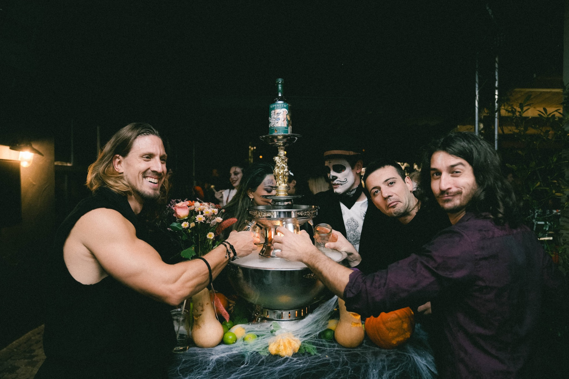 Artists and guests raising a toast